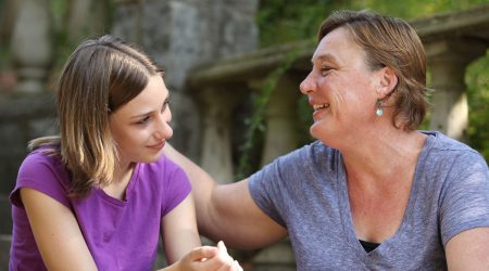 Mom talking to teen daughter