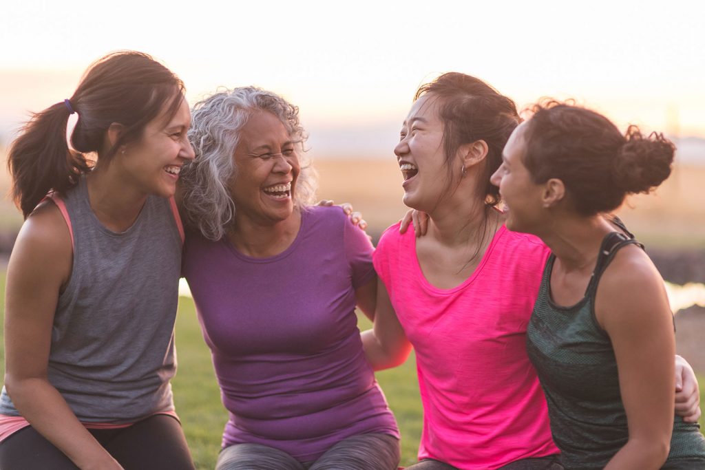 group of ladies sharing a funny story