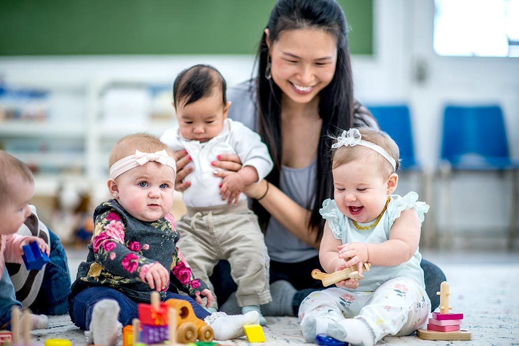 Babies at daycare playing.