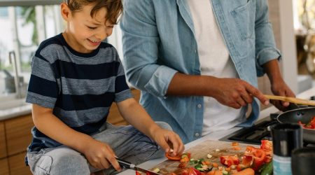 Child helps mom prepare healthy food