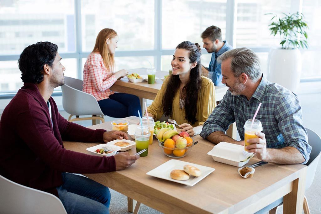 Three people enjoy lunch at restaurants nearby