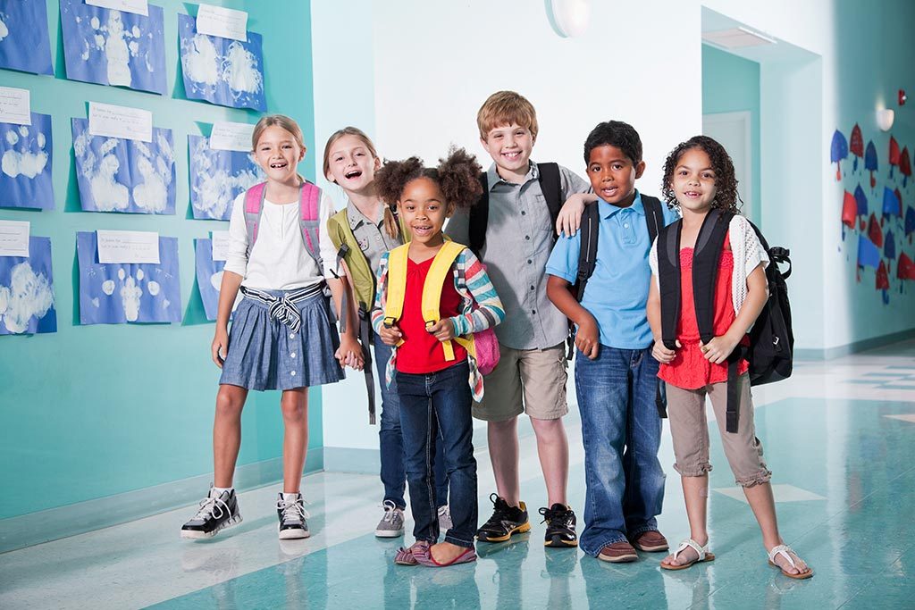 Group of young children in school hall